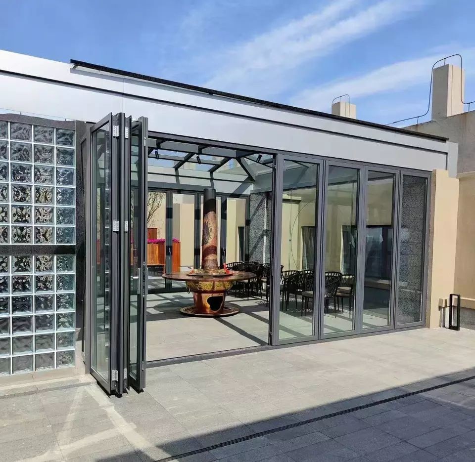 China Fire Retardant 3.0mm Aluminium Bifold Patio Doors Slide Folding Glass Door wholesale
