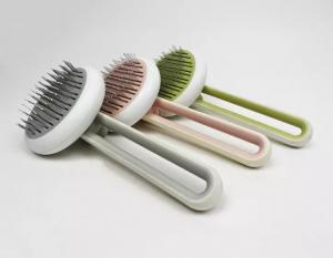 China Sustainable Pet Grooming Brush Self Cleaning Dog Pet Hair Remover Cat Comb With Massaging Bead On Tips wholesale