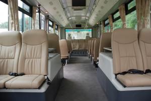 China 13 Seater Cummins Engine VIP Airport Shuttle Bus Luxury Coach Bus wholesale