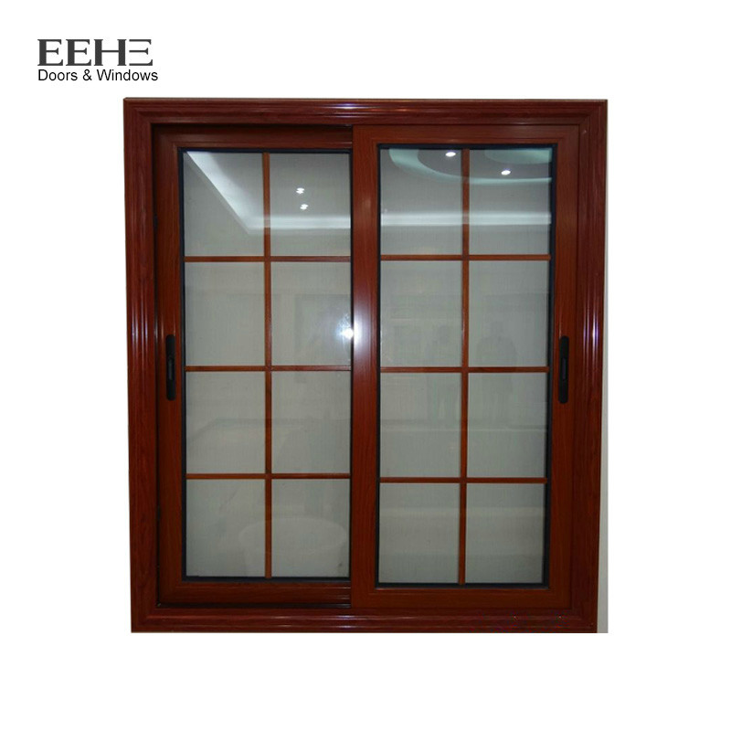 China Anodized Wood Color Aluminium Sliding Windows With Grill Water Resistance wholesale