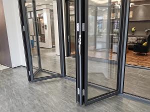 China Double Tempered Glass Black Aluminum Bifold Doors , Sliding Folding System Doors wholesale