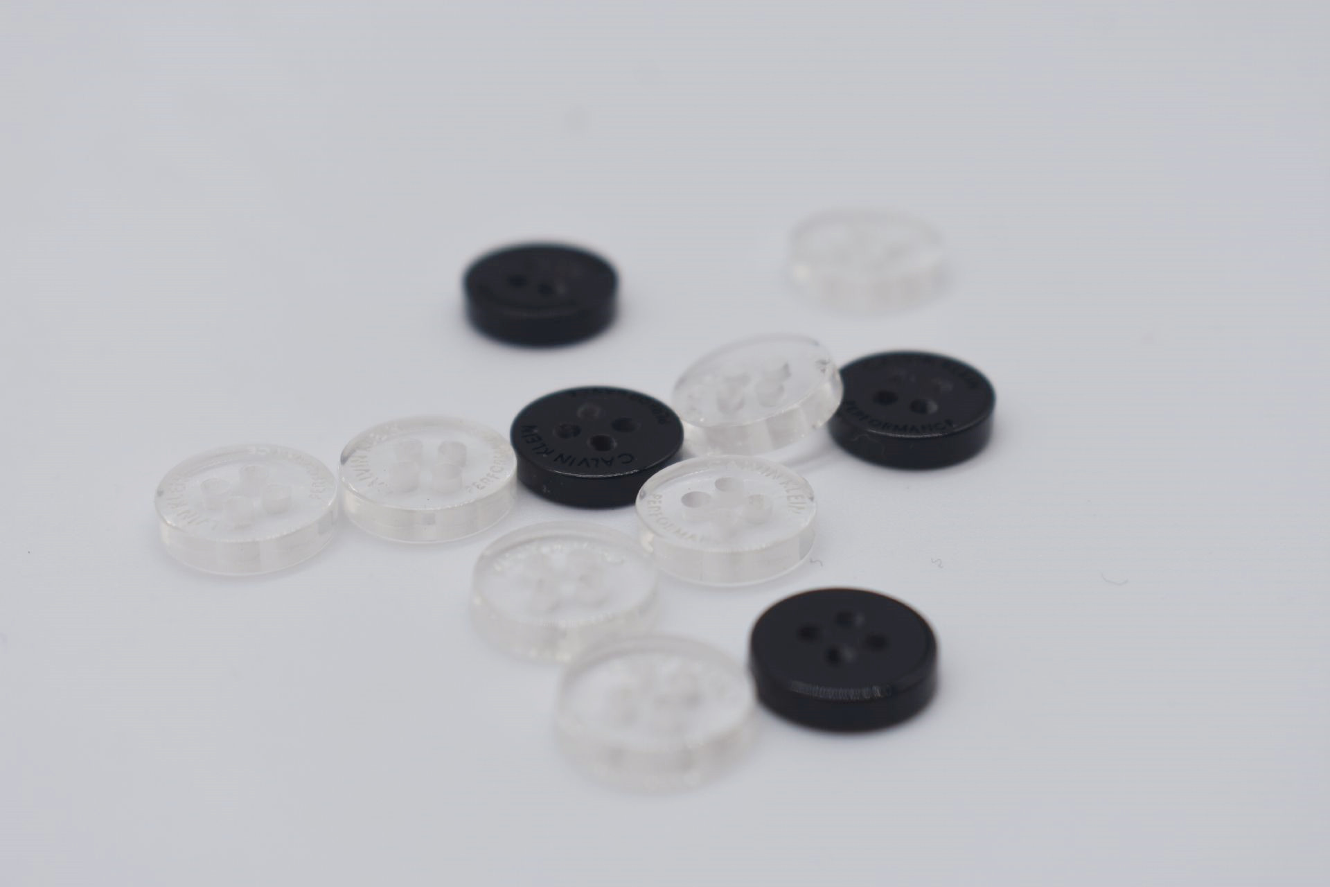 China Clear Plastic Garment Buttons Lettering Words 12L For Shirt Dress wholesale