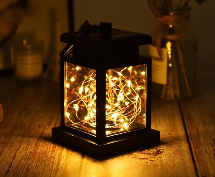 China Outdoor Solar Garden Lights IP65 Waterproof Solar Candle Flame Lamp Led Star String Flame Lights wholesale