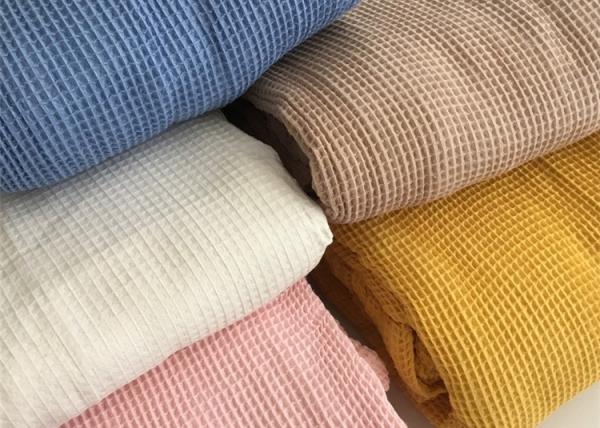 Quality 100%cotton knitted fabric popular in autumn/winter CVC waffle fabric for hotel pajamas, nightgowns and slippers for sale