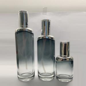 China 40ml 100ml 120ml Glass Lotion Bottle Set With Metallic Silver Shoulder wholesale