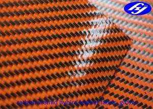 China Orange Polyurethane Leather Fabric Glossy Twill Carbon Kevlar Hybrid Fabric For Gloves wholesale