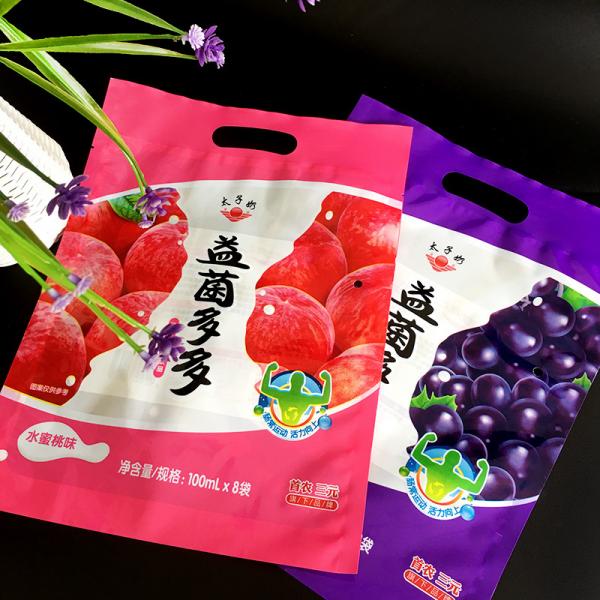 Quality Printing Colors Milk Plastic Bag Handle Packing Bag for sale