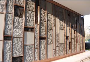 China Faux Stone Wall Cladding And Installed Within Stainless Steel Frame Surrounded wholesale