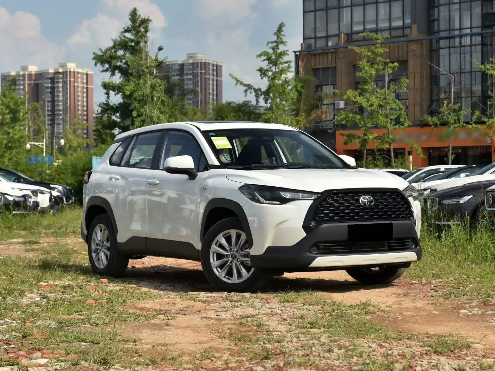 Corolla Cross Dual Engine Electric Hybrid White Available Compact SUV E-CVT continuously variable transmission