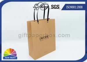 China Logo Printed Kraft Paper Bags Plastic Handles Brown Paper Shopping Bags FOR Garment wholesale