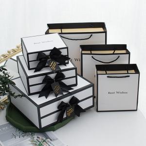 China Whole Sales Luxury Clothes Perfume Gift Set  Package Ribbon Bow Magnetic Closure Cardboard Folding Gift Box wholesale