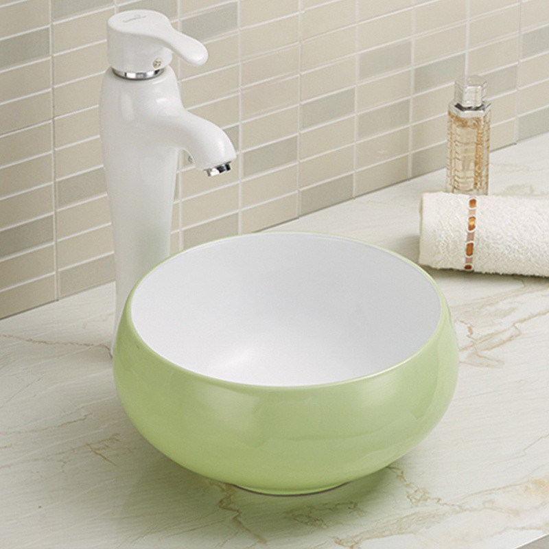 Sleek And Elegant Counter Top Bathroom Sink White Oval Shape Wash Basin