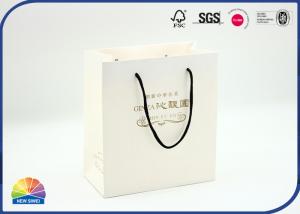 China Custom Printed Paper Gift Bag Portable Coated Flat Pack Shoe Medium Shipping Bags on sale